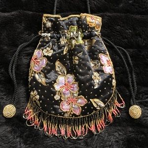 Beaded and satin purse with floral print.